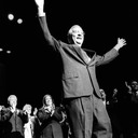 Walter Mondale and Geraldine Ferraro waving.